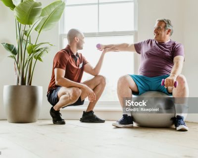 Men training in a fitness gym